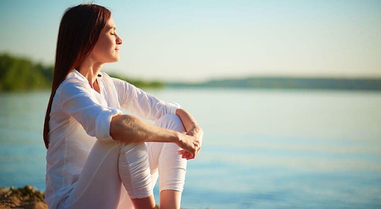 Woman relaxing on beautiful sea view